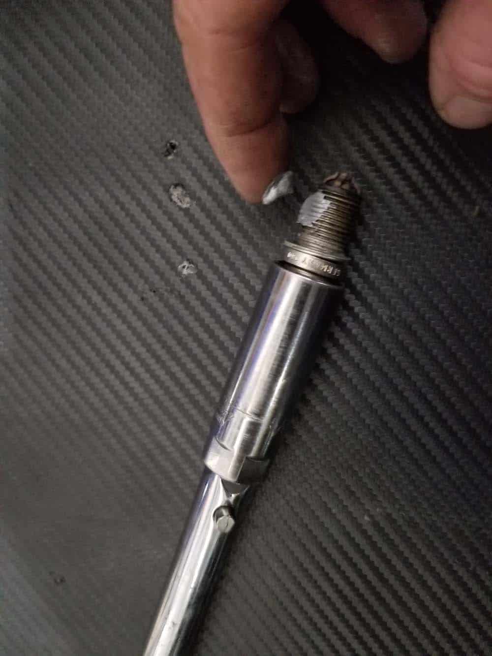 BMW E60 Tune Up - Add a small amount of anti-seize lubricant to the end of the spark plug