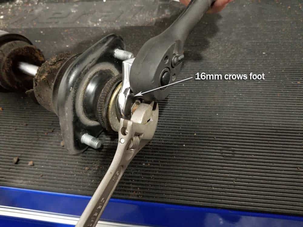 BMW E46 rear shock - remove shock mount lock nut