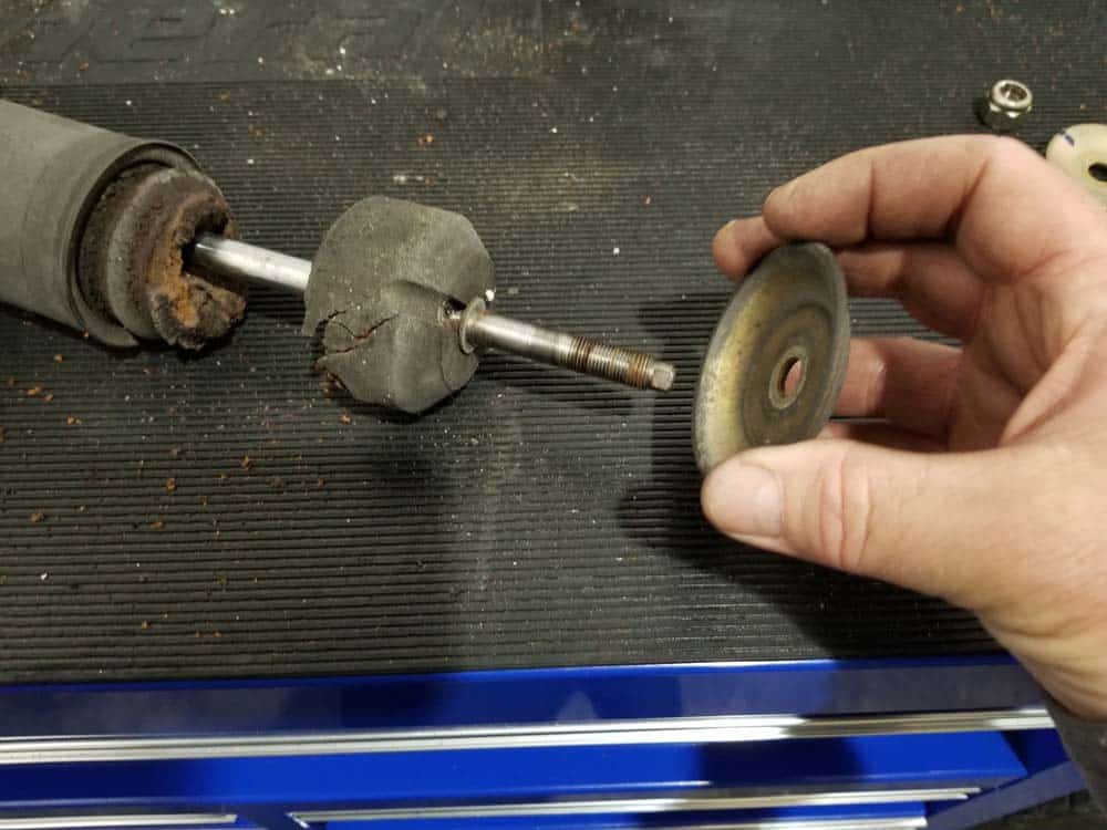 Remove second plate from shock absorber