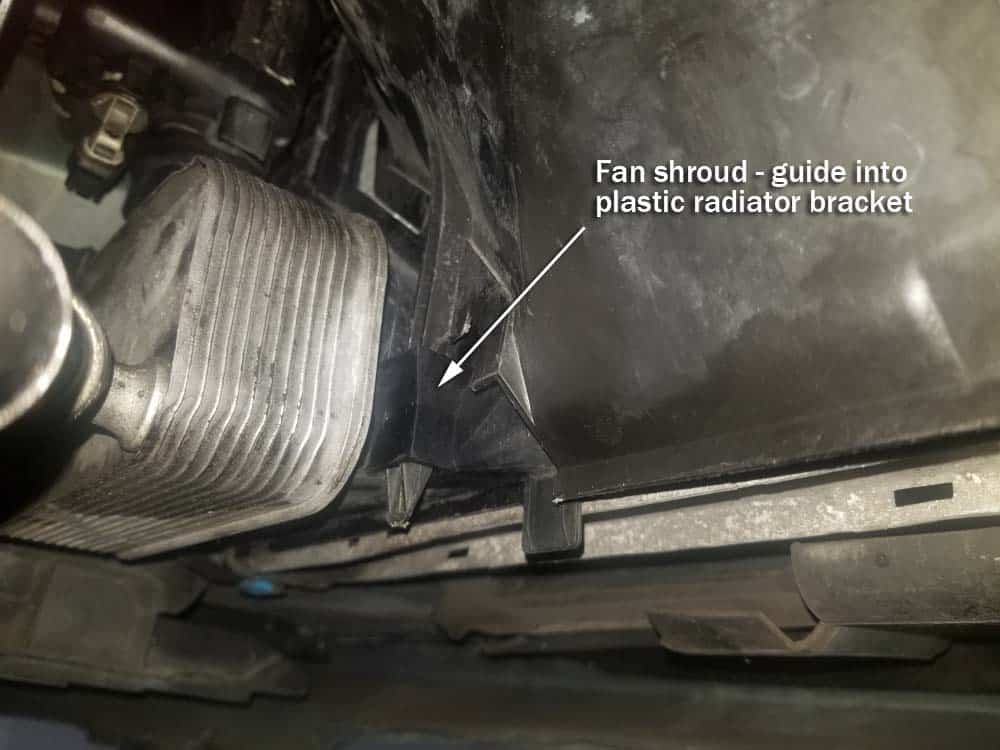 Guide the fan shroud into the radiator bracket