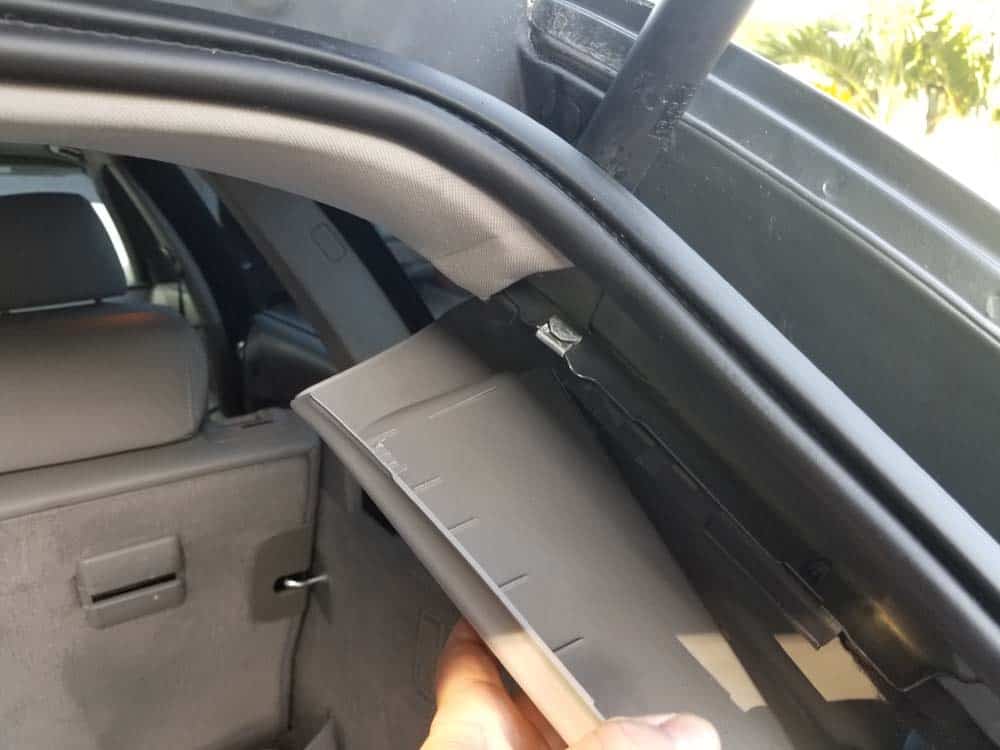 bmw e61 trunk leak - remove top part of the trim