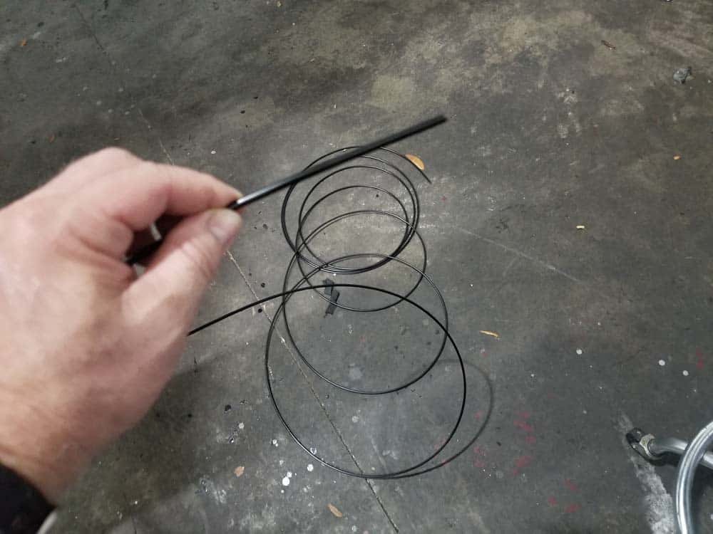 bmw e61 trunk leak - 4mm shifter cable...use to snake the drain lines