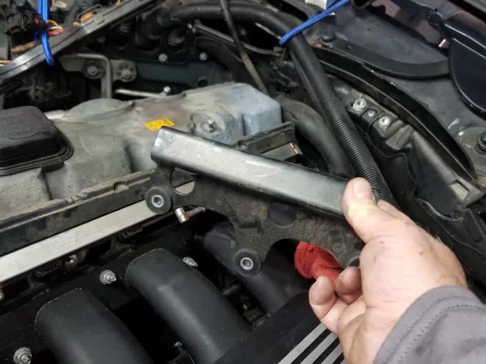 BMW E60 valve cover repair - remove fuel rail mounting bracket