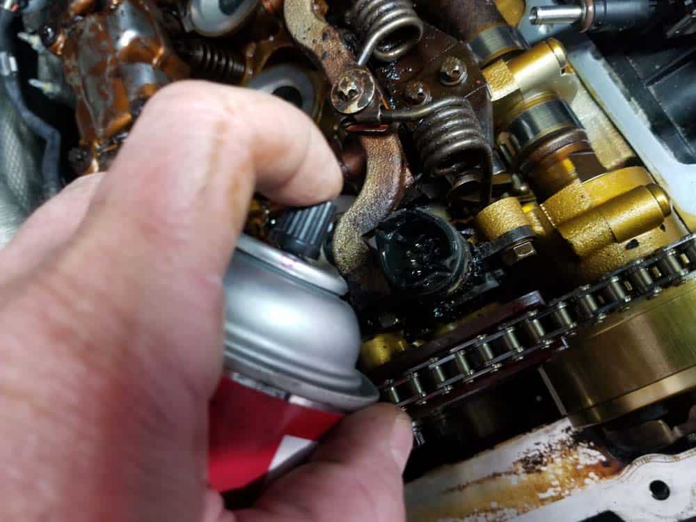 BMW E60 valve cover repair - clean eccentric valve electrical connection