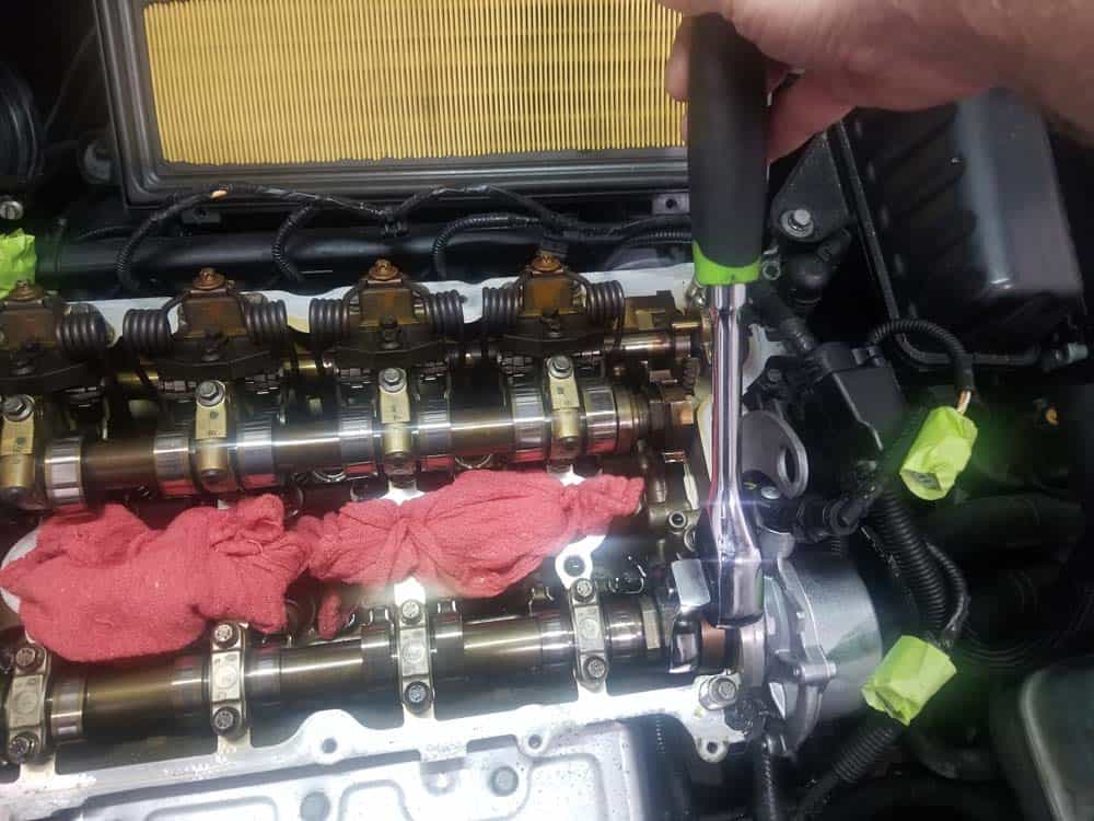 MINI R56 engine timing calibration - spin the camshafts until the labels are facing up.