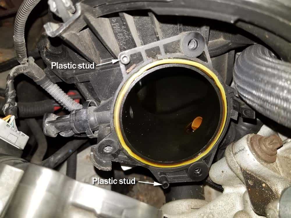 MINI R56 intake gasket repair - Line the throttle body back up on the plastic studs on the intake manifold.