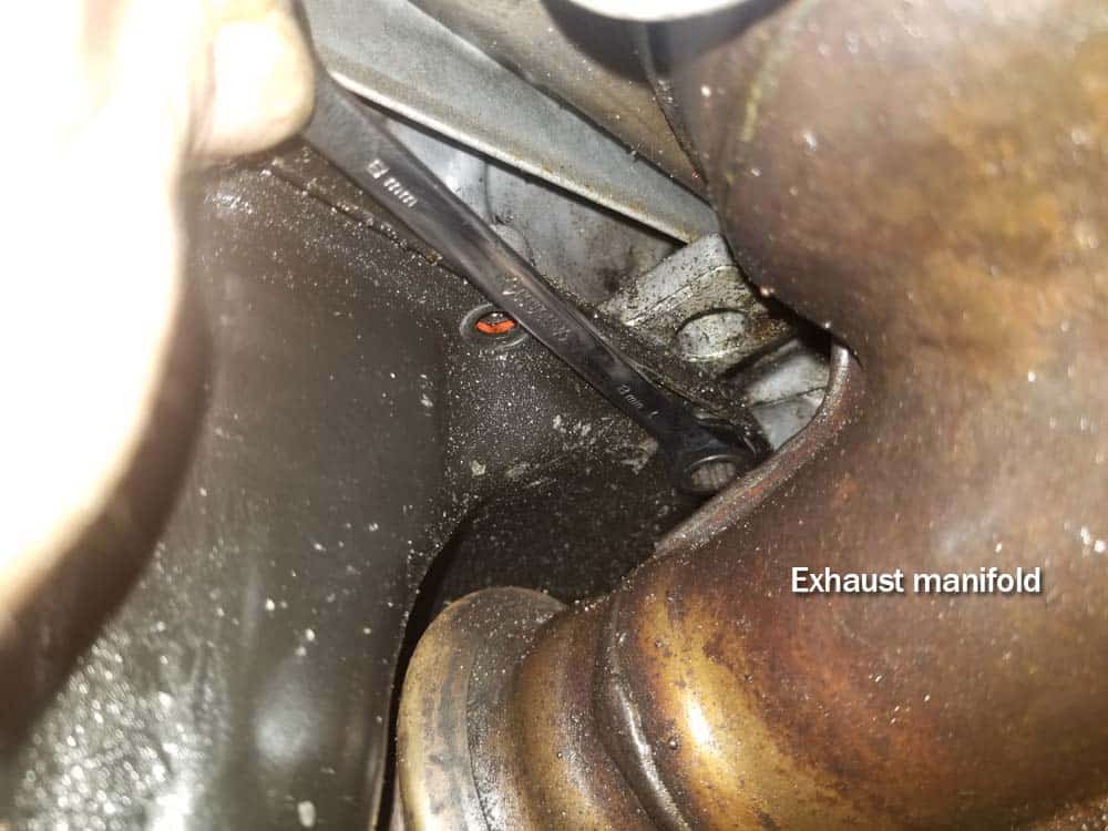 MINI R56 Oil Pan Gasket Replacement - remove bolt behind exhaust manifold