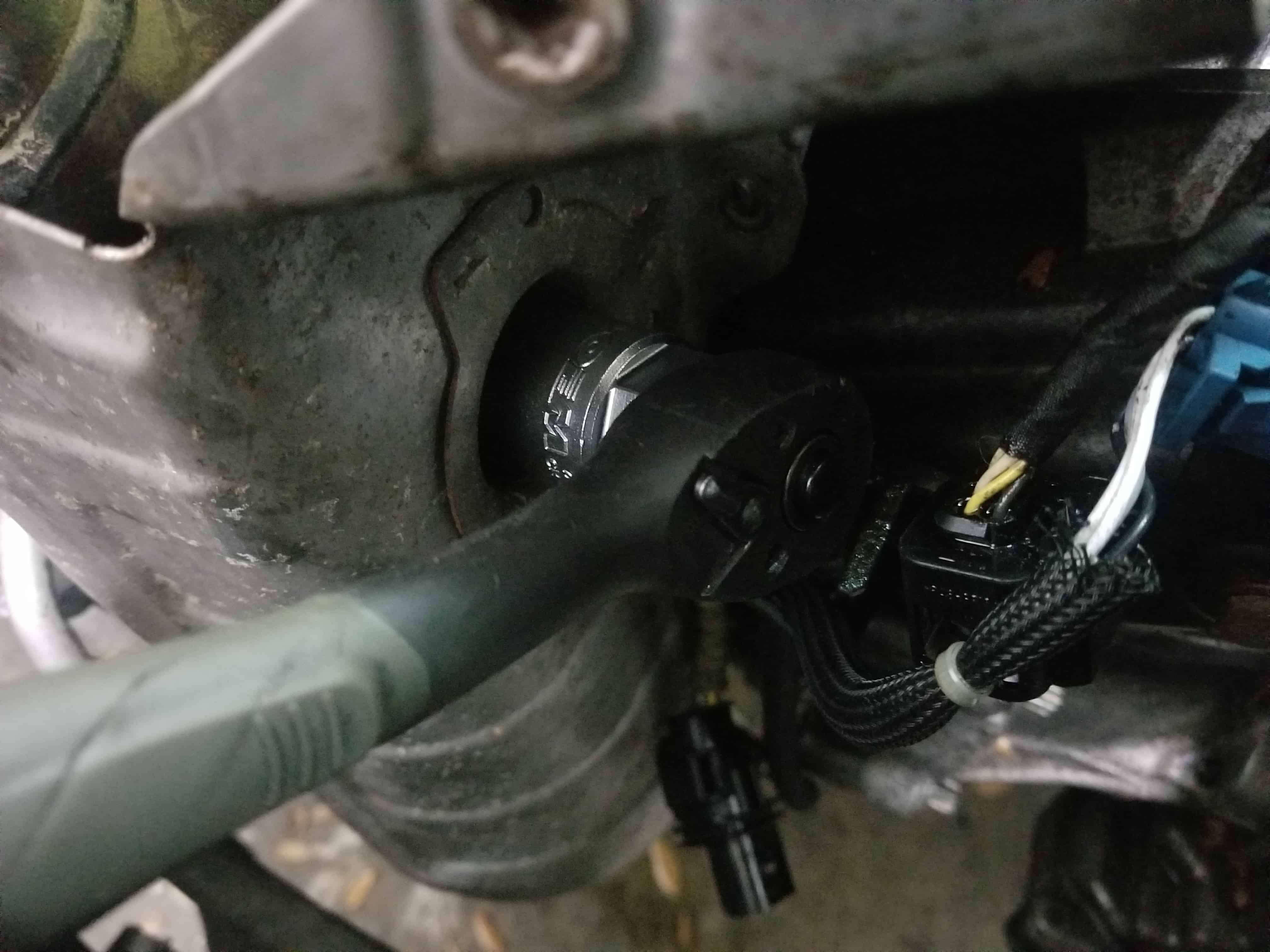 Remove the oxygen sensor from the exhaust manifold