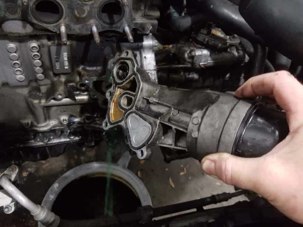 MINI R56 oil filter housing leak repair - remove the housing from the engine