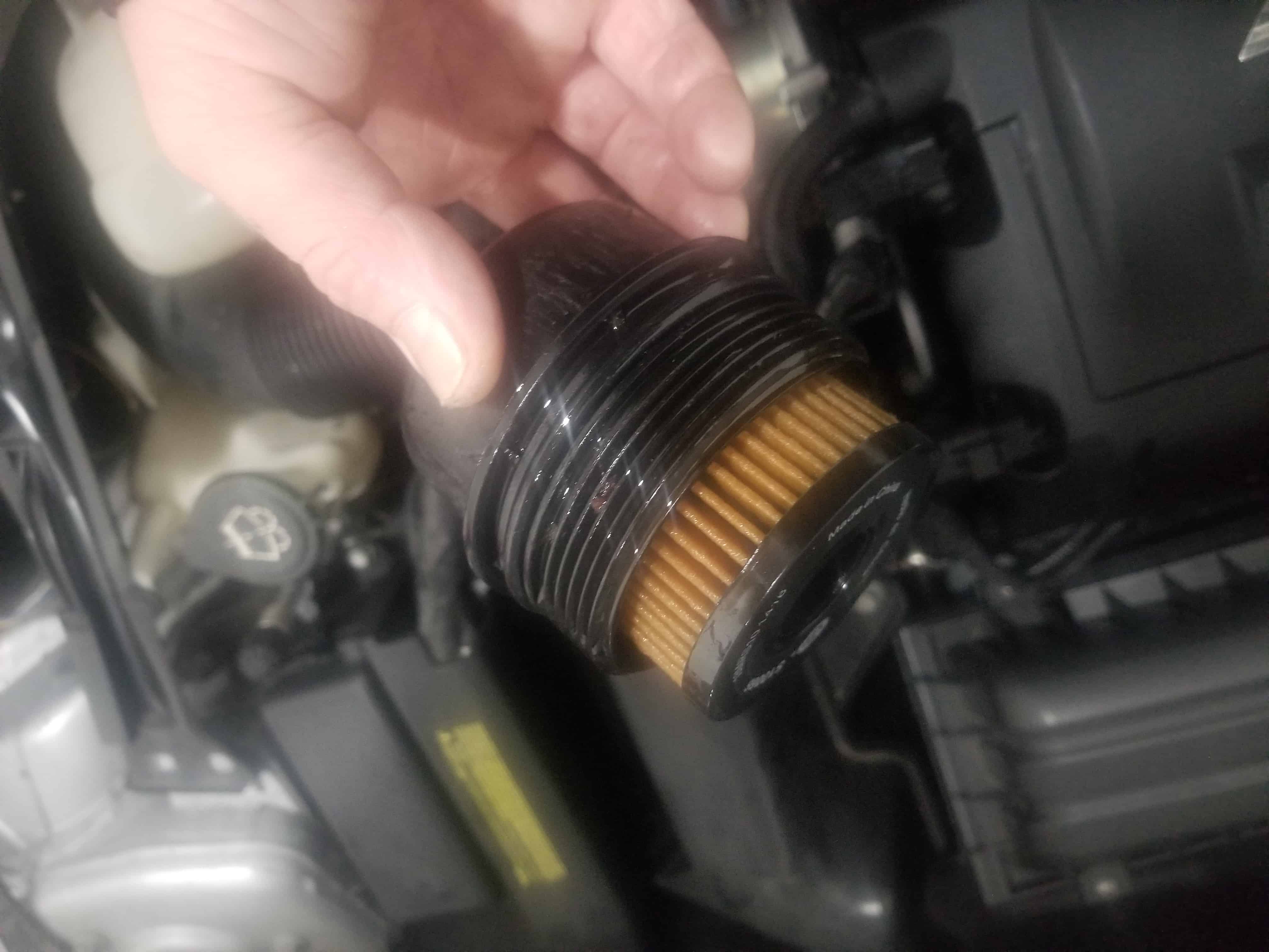 MINI R56 Oil Pan Gasket Replacement - remove the filter cover