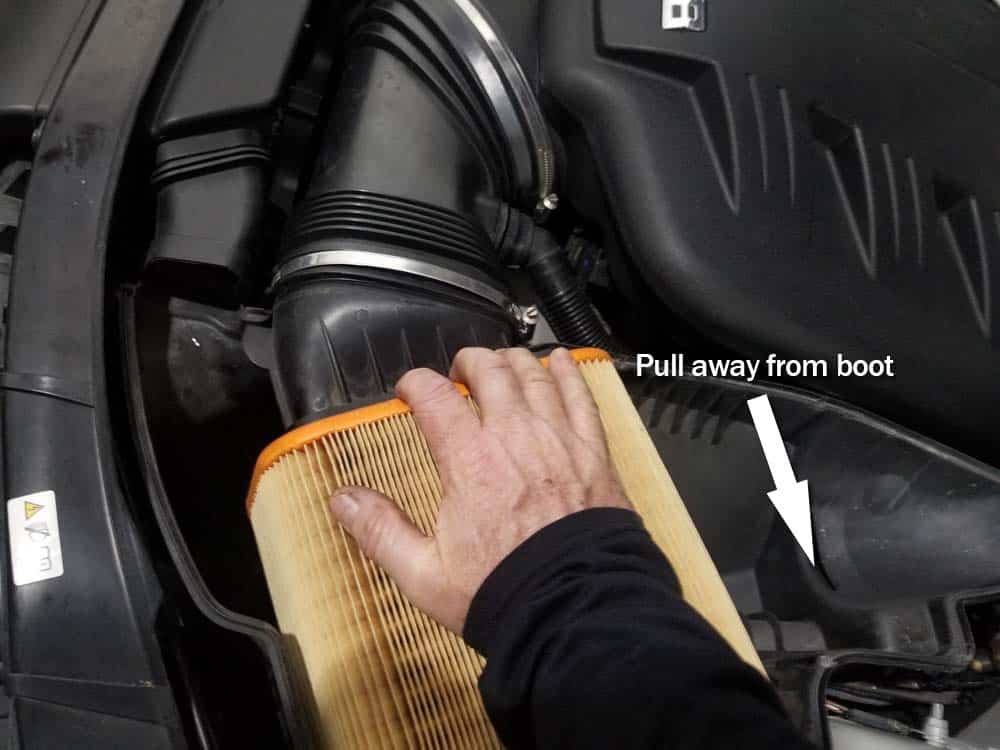 pull air filter away from rubber boot