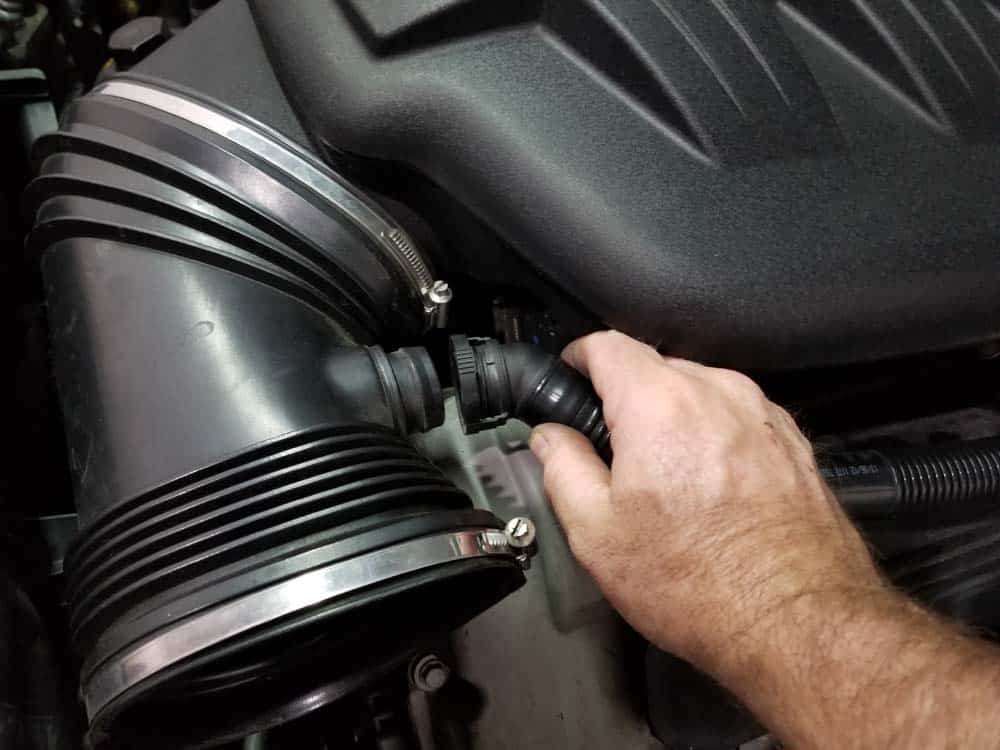 Disconnect the vent hose from rubber boot