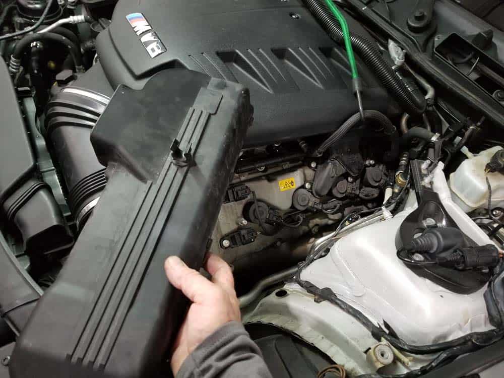 Remove the left engine cover from the vehicle