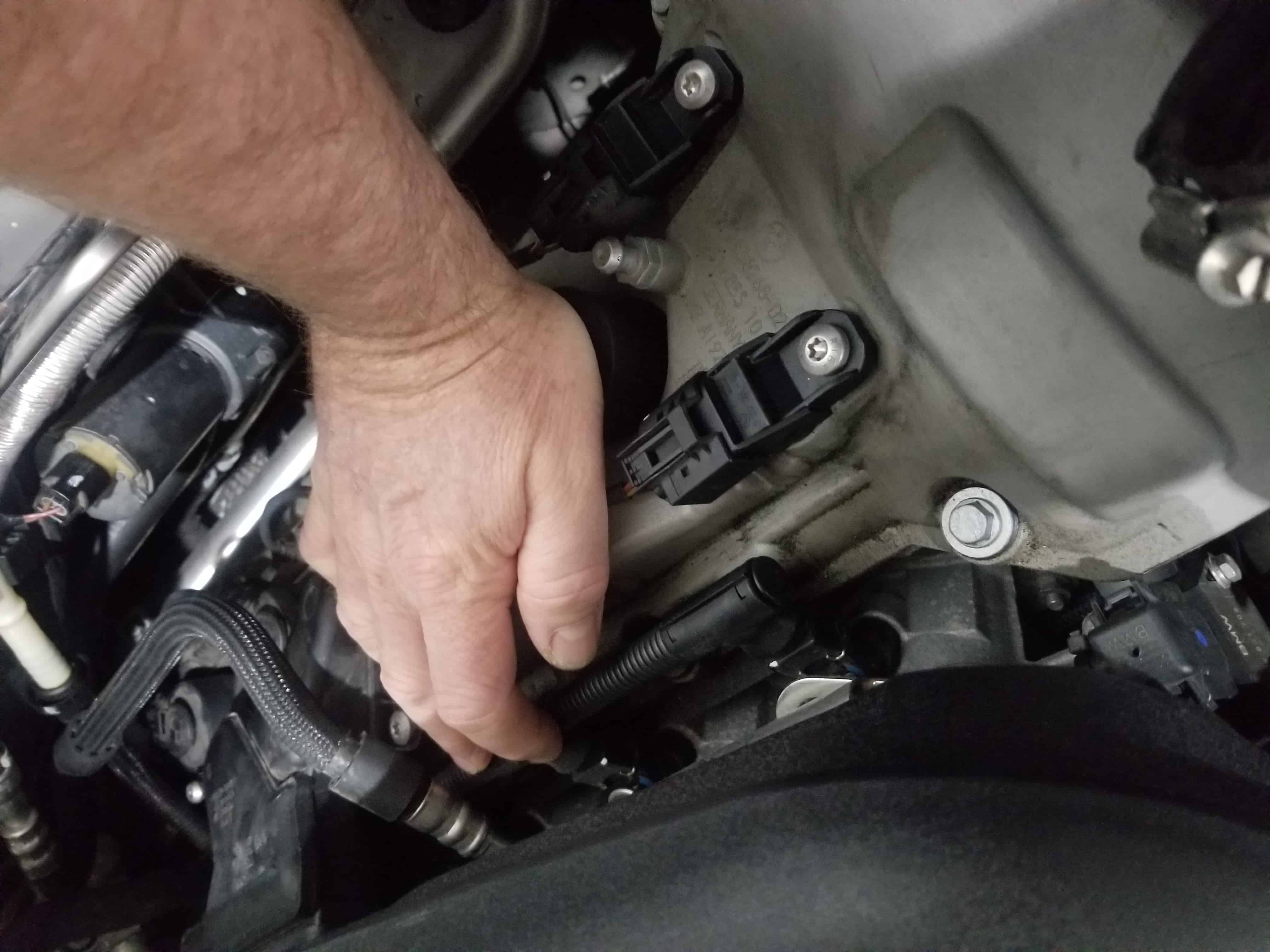 BMW E90 M3 tune up - install ignition coil with palm of hand