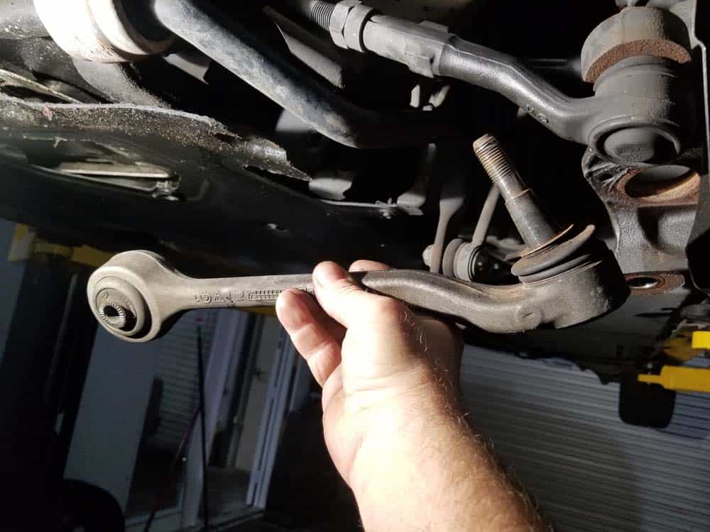 BMW E60 xDrive front control arms - remove the lower control arm from the vehicle