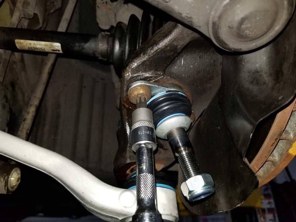 BMW E60 xDrive front control arms - install the new tension strut ball joint