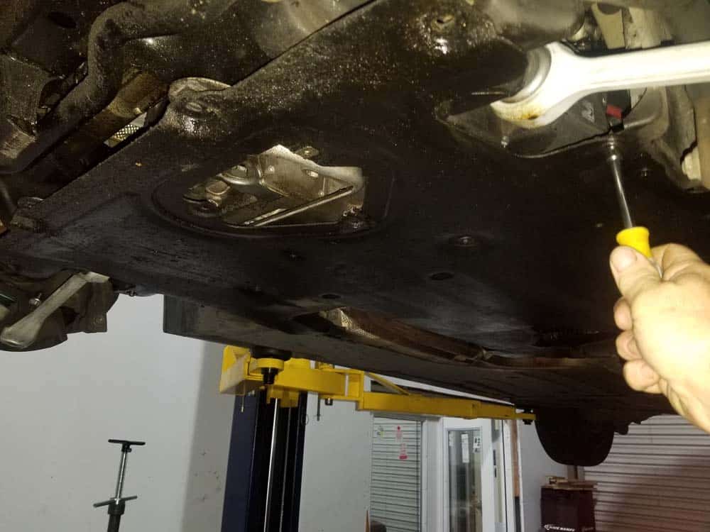 BMW transmission solenoid replacement - Remove the underfloor (rear) belly pan