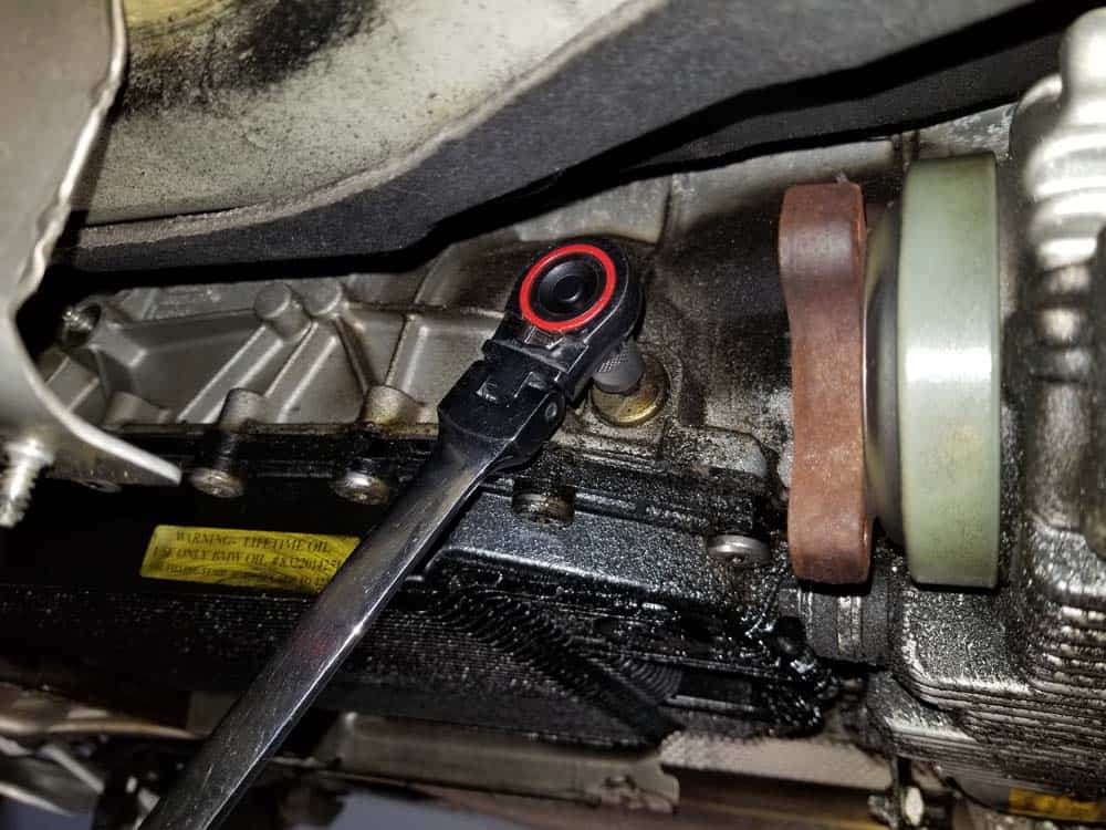 BMW Mechatronics Sealing Sleeve and Adapter Replacement - Remove the transmission fill plug