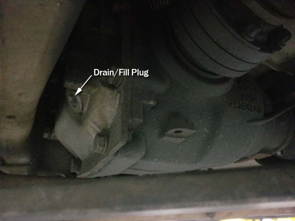 BMW E60 differential service - rear differential with one plug that serves as both the fill and drain hole.