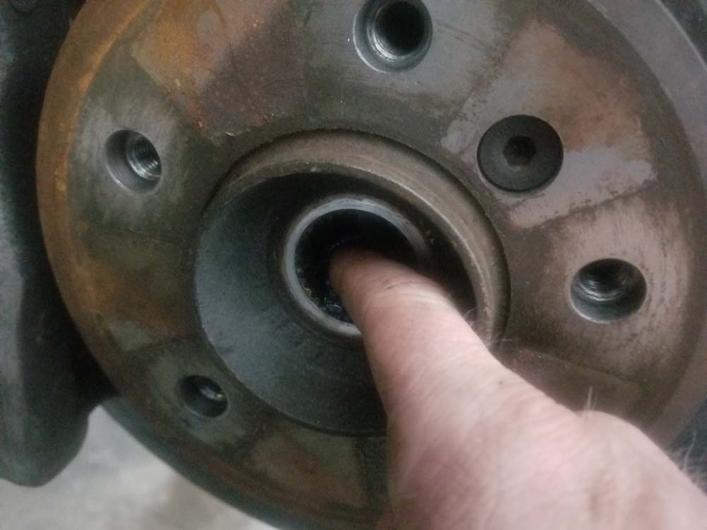 bmw e60 front axle shaft - Apply a generous amount of waterproof grease to the hub splines with your finger. 