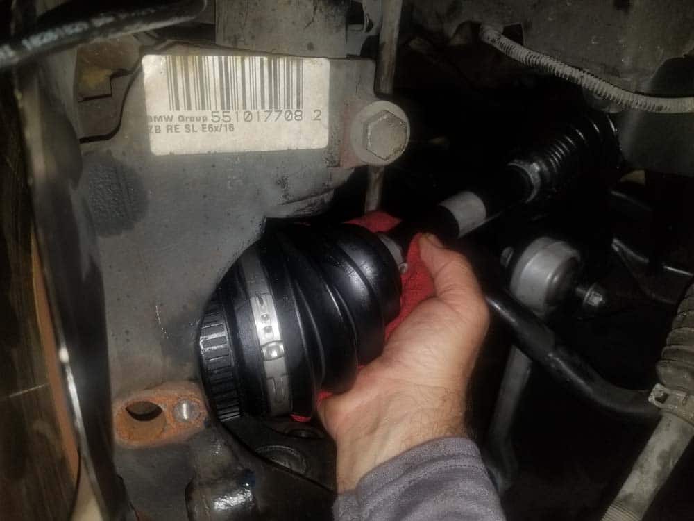 bmw e60 front axle shaft - Install the new axle shaft into the hub