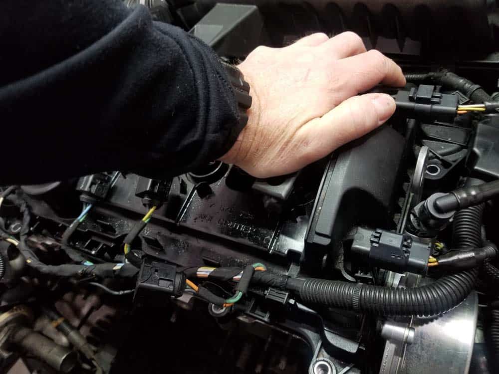 MINI R56 Tune Up - Press the ignition coils onto the spark plugs with the palm of your hand.