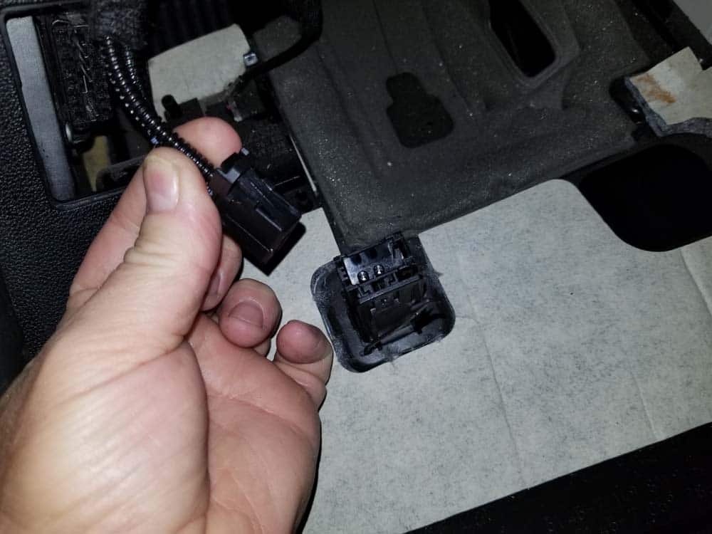 bmw footwell module - Disconnect the MOST diagnosis port
