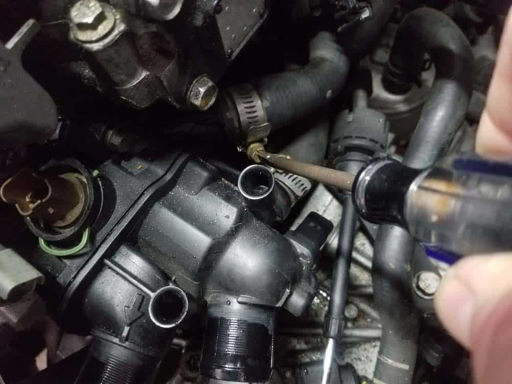 MINI R56 thermostat replacement - Remove the rear heater hoses.