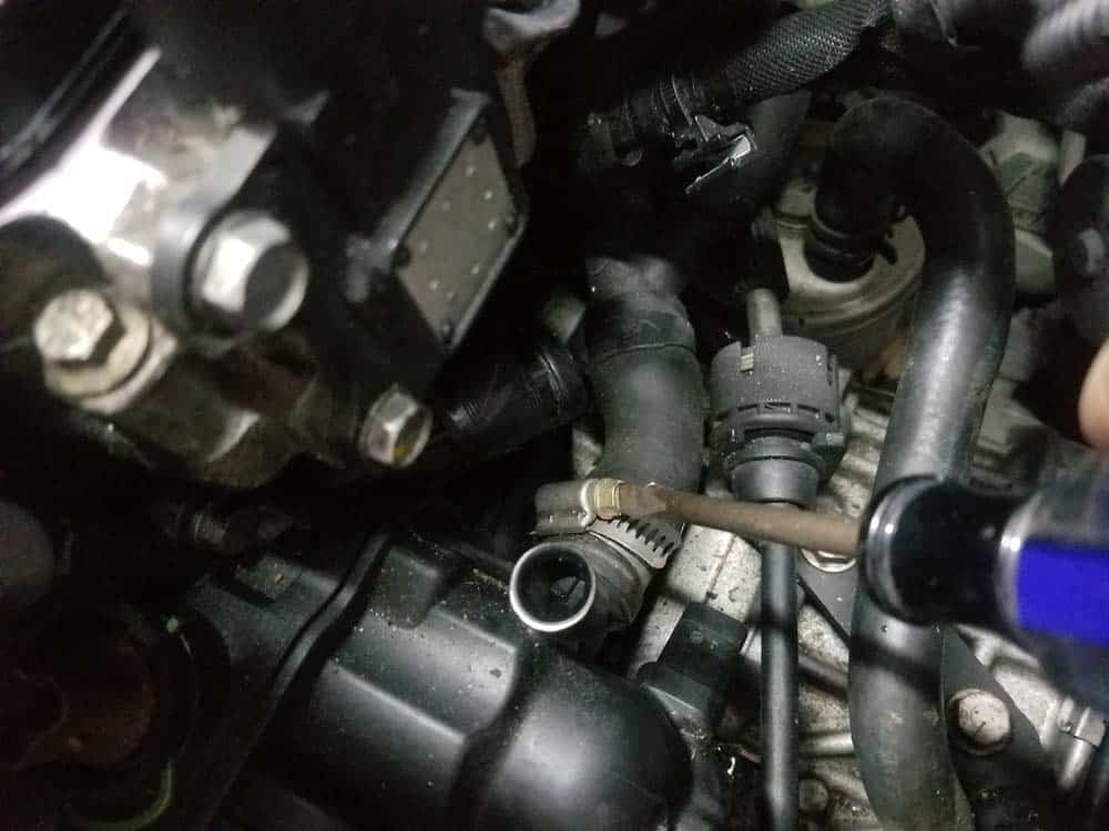 Mini R56 water pipe replacement - Remove the rear heater hoses.