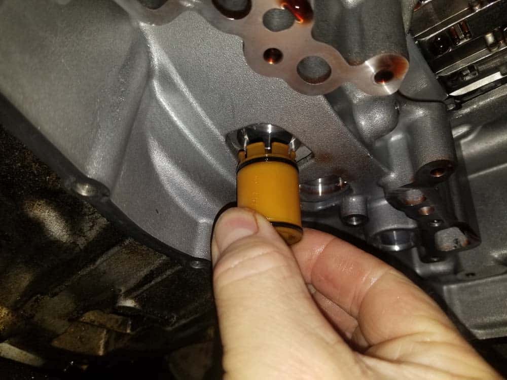 BMW 5HP19 solenoid replacement - Remove the left pipe from the transmission