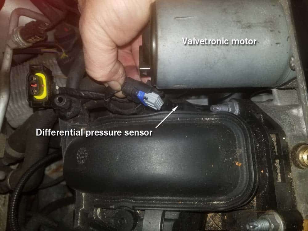 MINI R56 intake gasket repair - Disconnect the differential pressure sensor.
