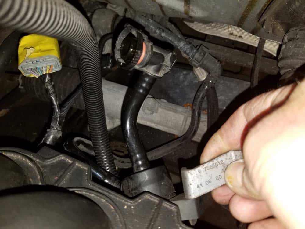 MINI R56 intake gasket repair - Stow the valve and vacuum line out of the way.