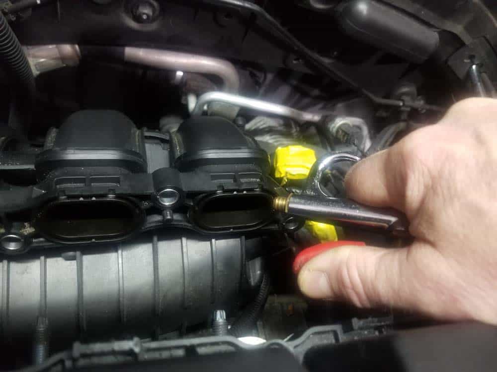 Use compressed air to blow dirt out of the intake manifold