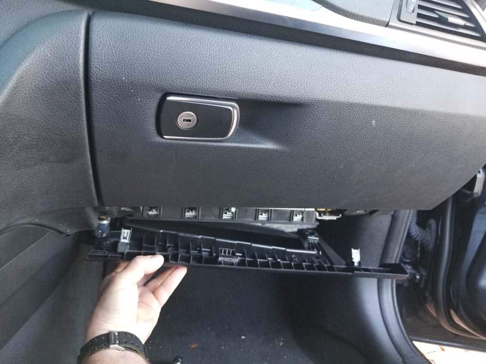 Pull the trim panel down