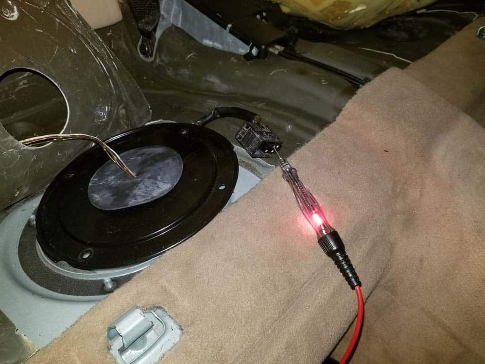 Use a test light to see if there is power at the blue/white wire in the fuel pump plug.
