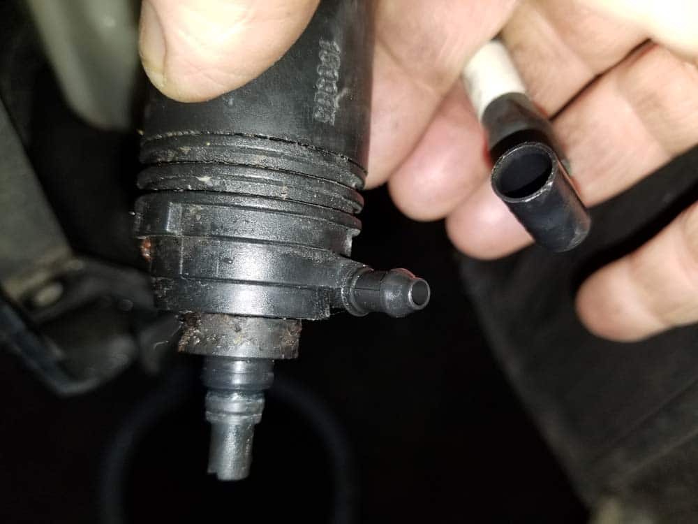 bmw e60 windshield washer pump replacement - Disconnect the fluid feed tube from the pump