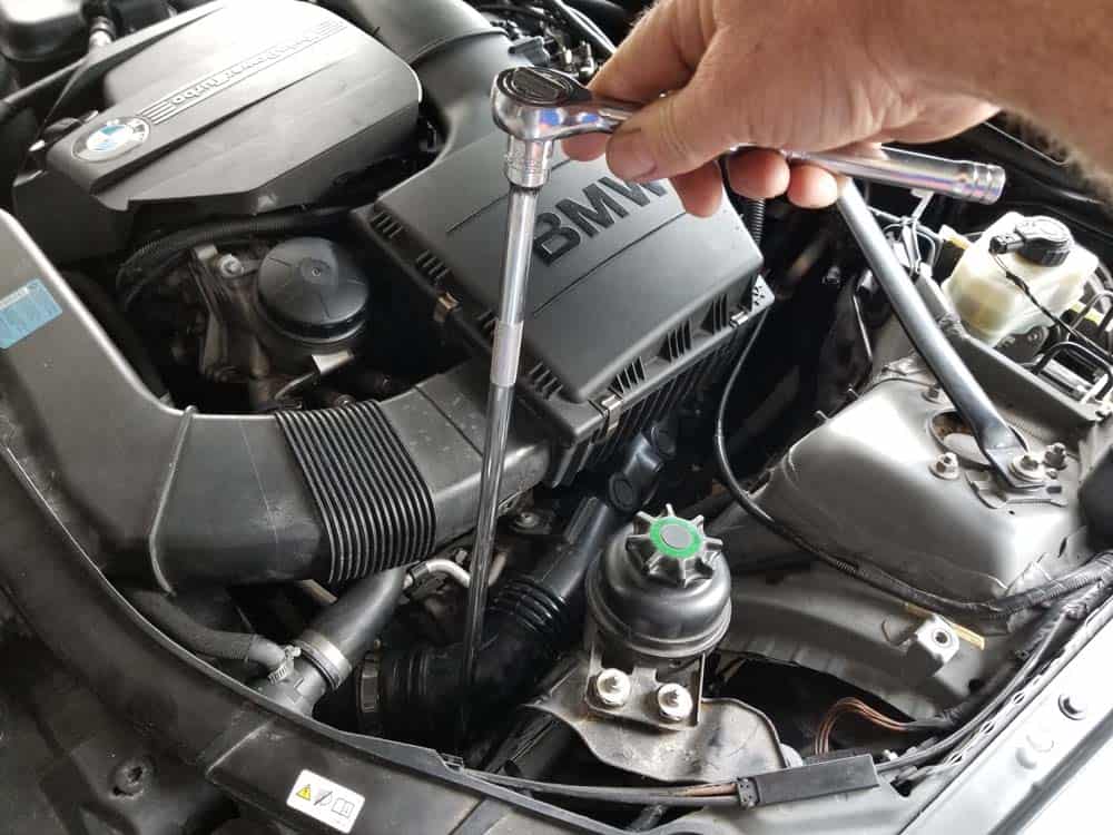 bmw e90 angel eye bulb replacement - Remove the two nuts anchoring the power steering reservoir