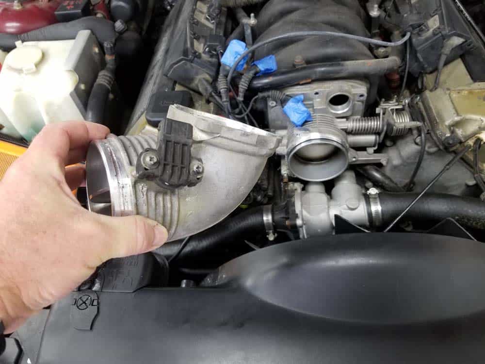 bmw M60 throttle body gasket replacement - Grasp the secondary throttle and remove from the throttle body