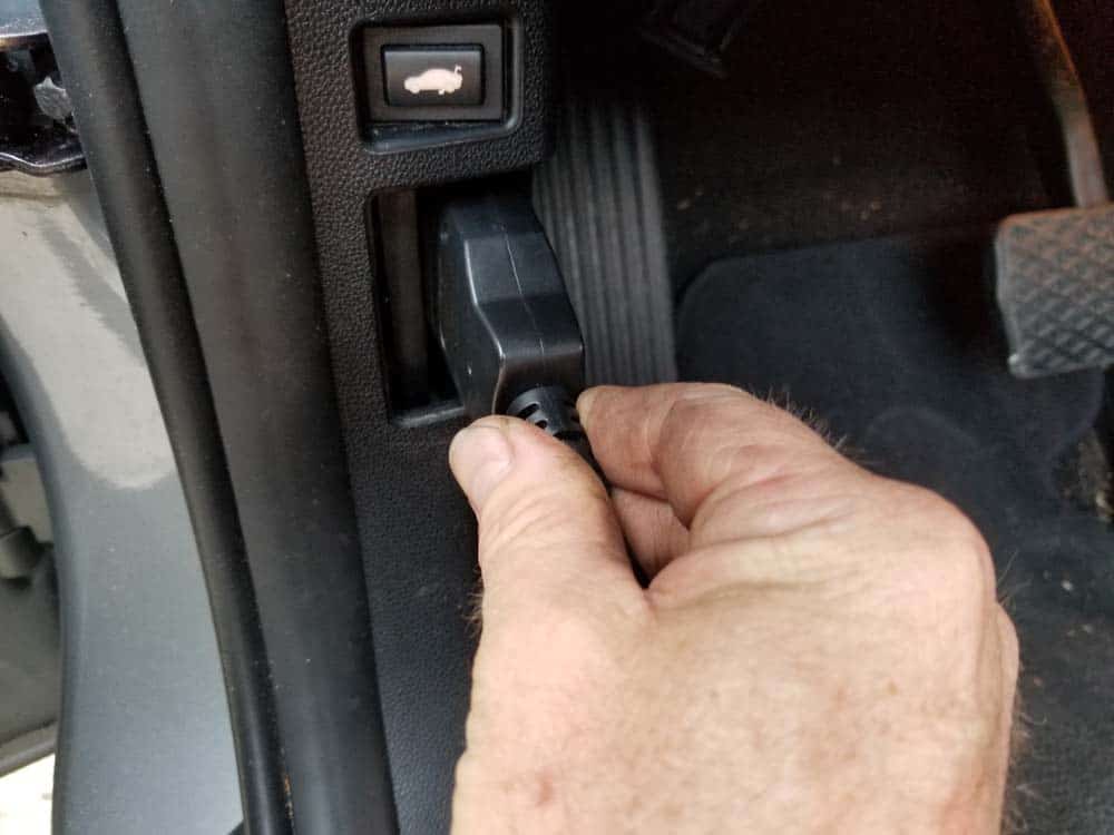 Plug in the scanner into the OBD2 port