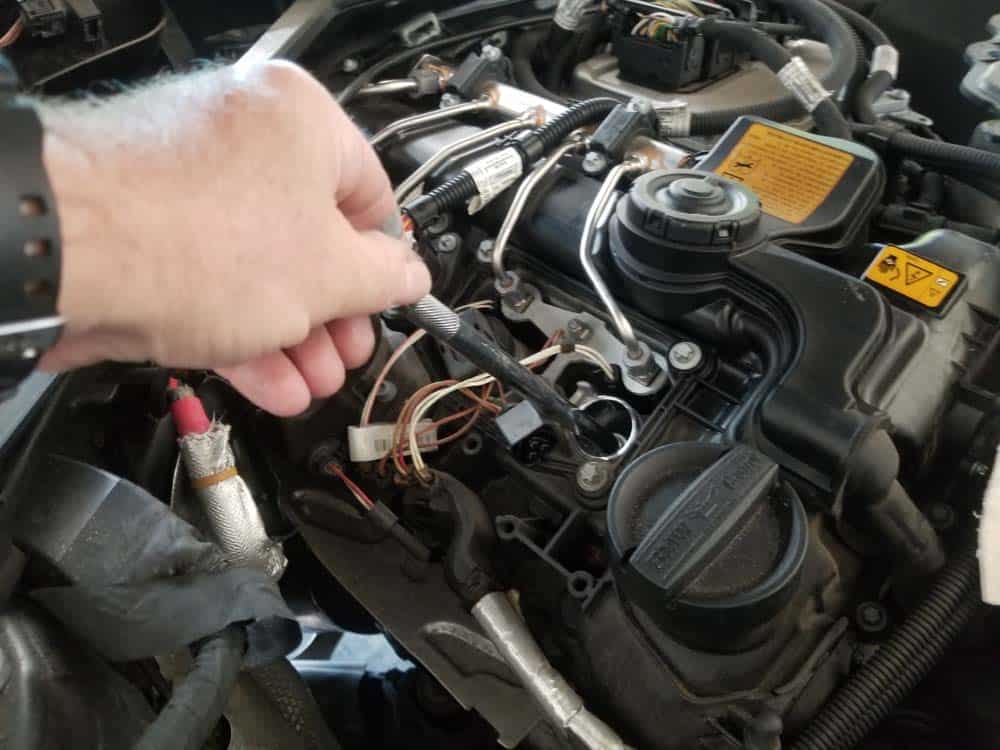 bmw f30 spark plug replacement - Install the new spark plug and hand tighten