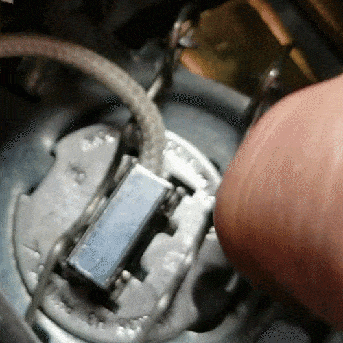 bmw e90 cornering light replacement - Disconnect the bulbs metal locking clips
