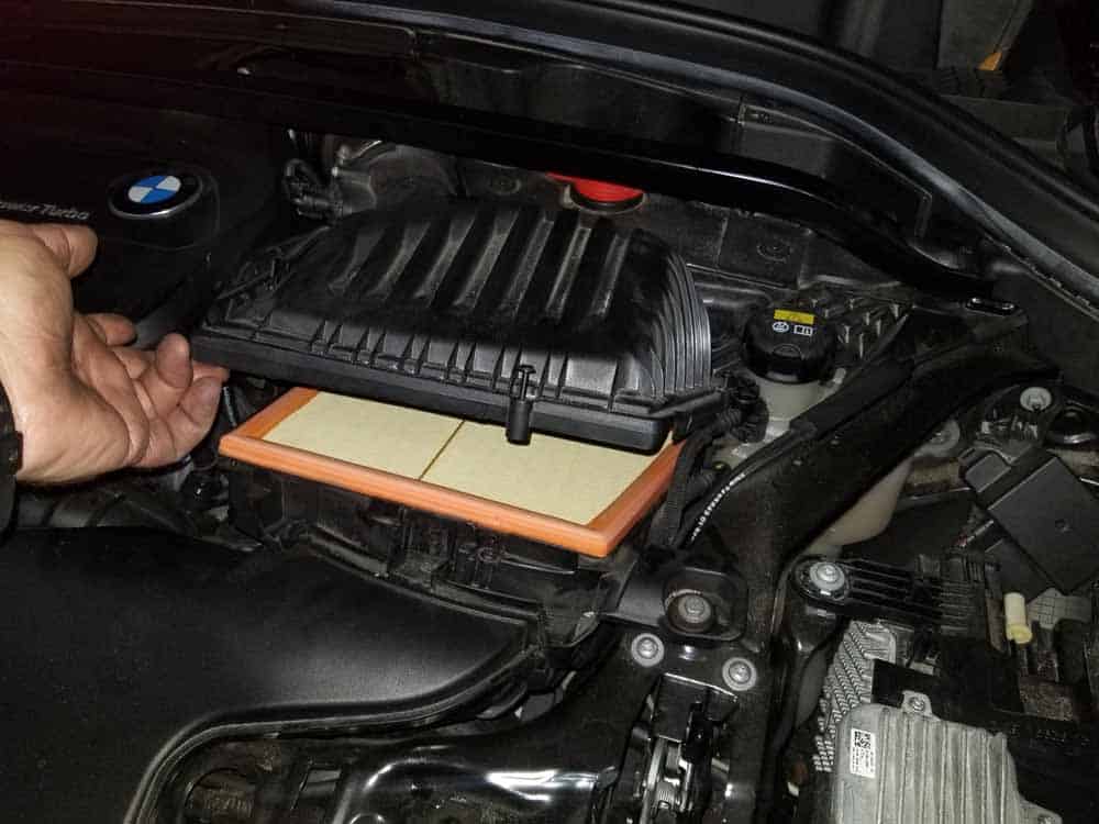 bmw x2 air filter replacement - Lift the cover of the intake muffler
