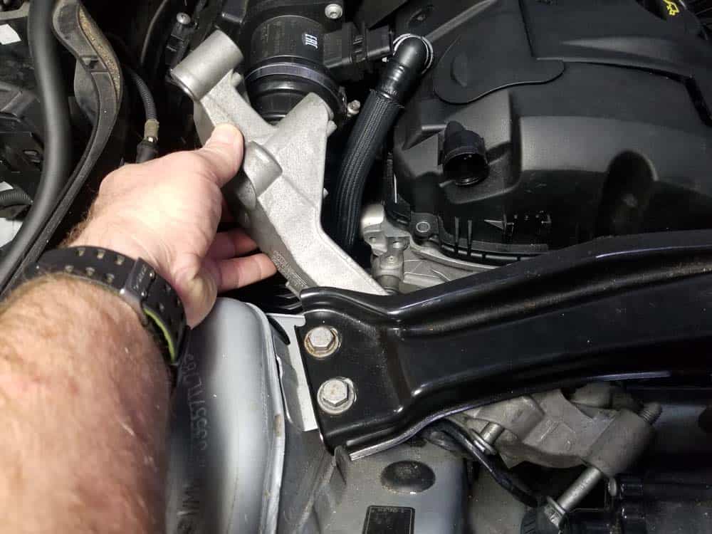 mini r56 water pump replacement - Install the bracket back into the engine
