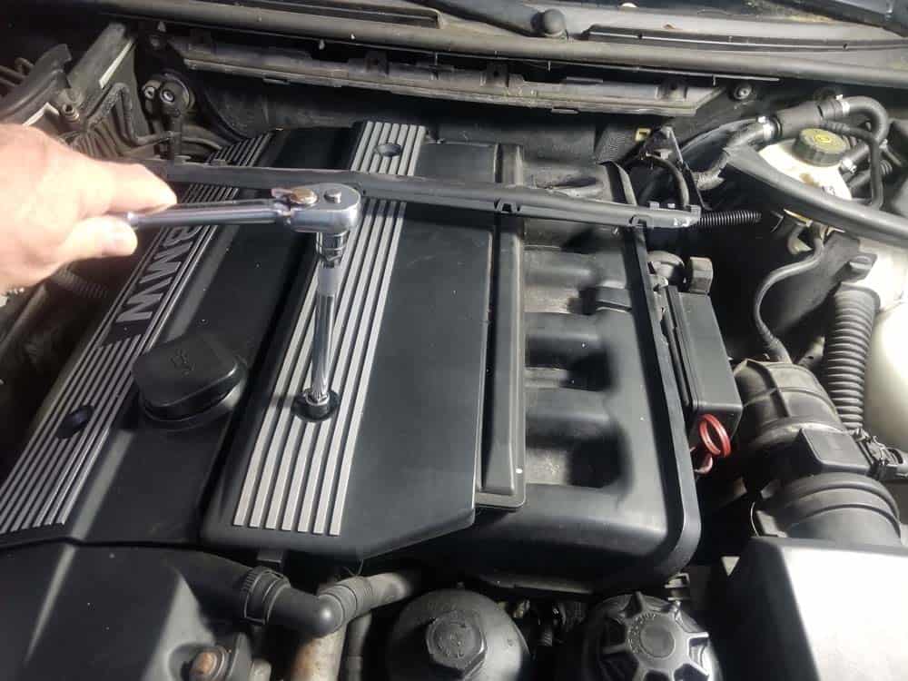 bmw e46 fuel injector replacement - Remove the 10mm bolts from the left engine cover