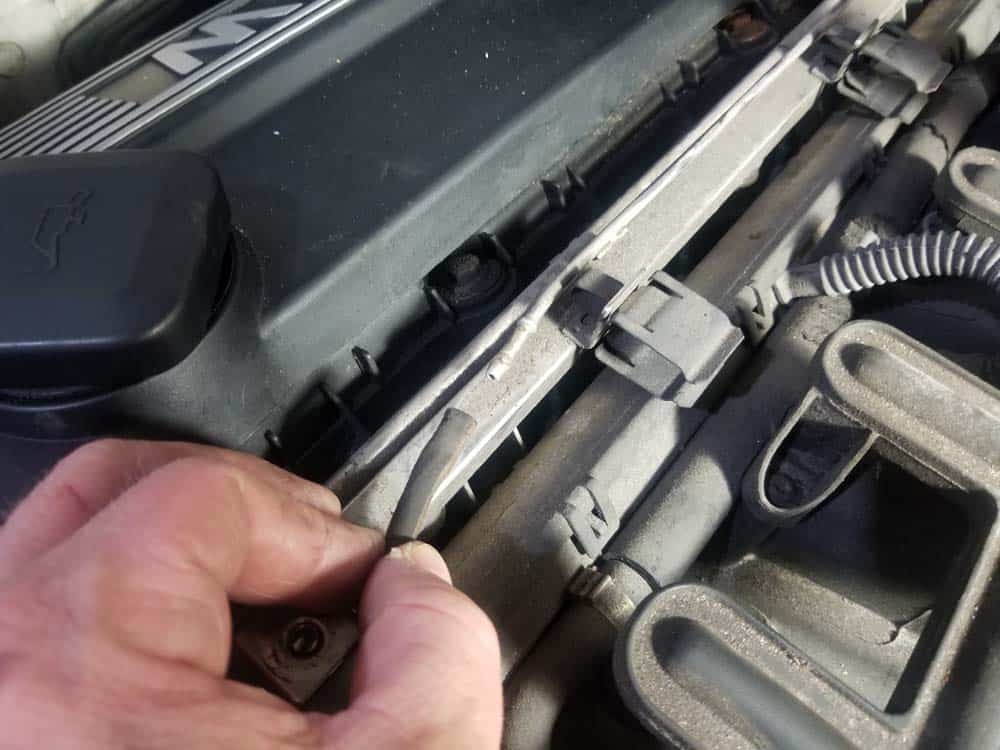 bmw e46 fuel injector replacement - Disconnect the vacuum lines from the top of the fuel rail
