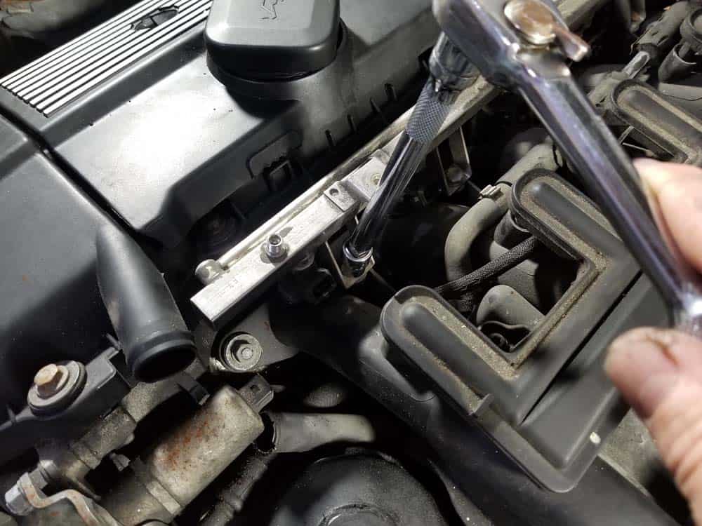 bmw e46 fuel injector replacement - Remove the four 10mm fuel rail mounting bolts