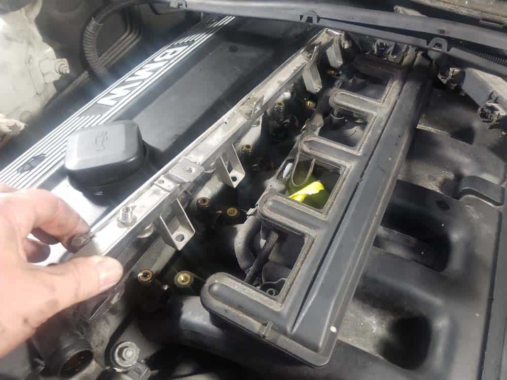 bmw e46 fuel injector replacement - Pull the fuel rail free of the injectors
