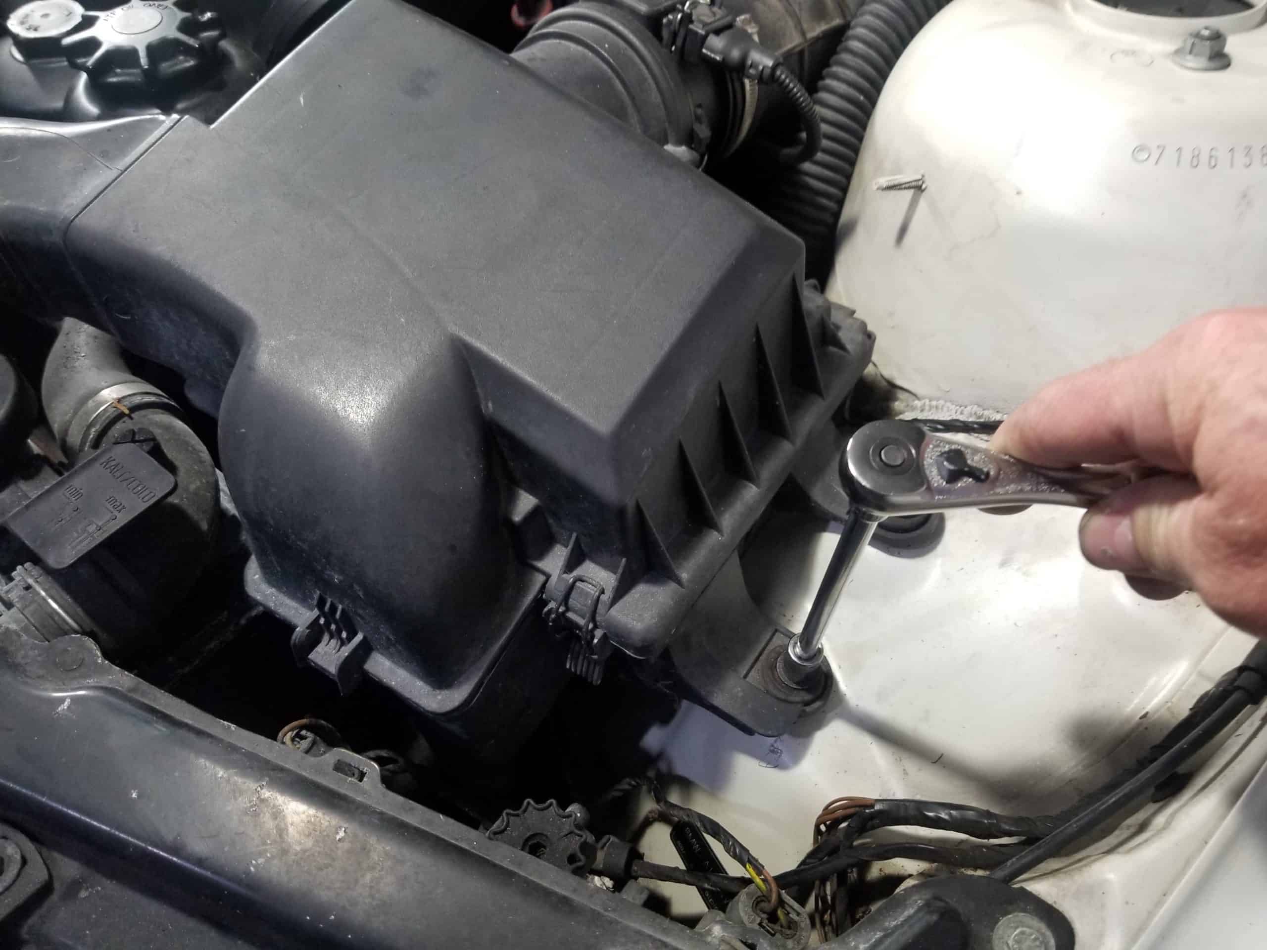 bmw m52 intake manifold removal - Remove the intake muffler from the vehicle.