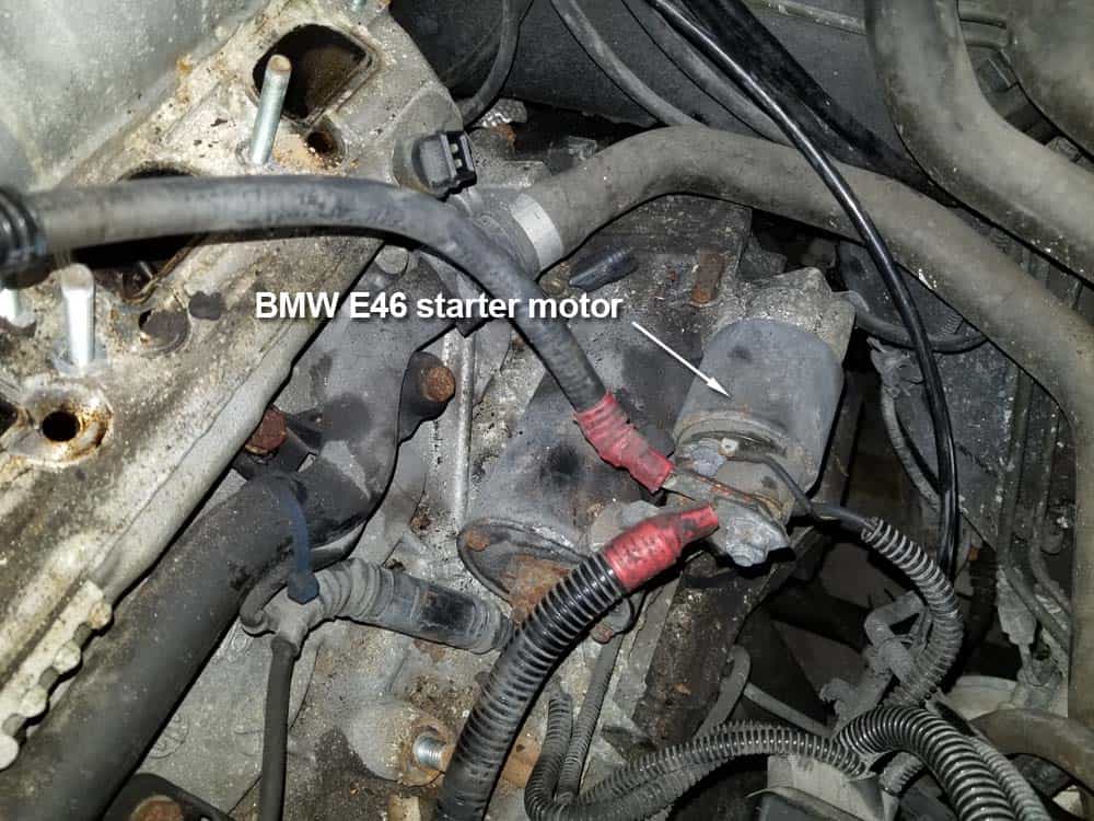 bmw e46 starter replacement - Locate the starter motor at the rear of the engine