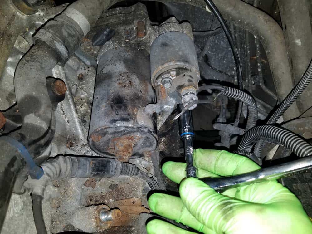 bmw e46 starter replacement - Remove the lower wiring harness lead from the solenoid